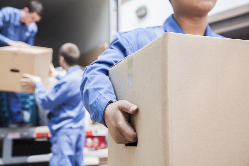 Removal services in Fulham with moving boxes and a professional team