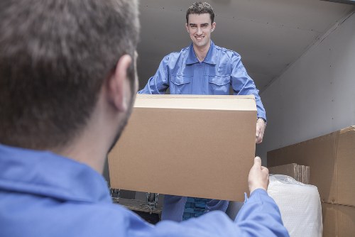 Customer service team reviewing a complaints file during a removals case