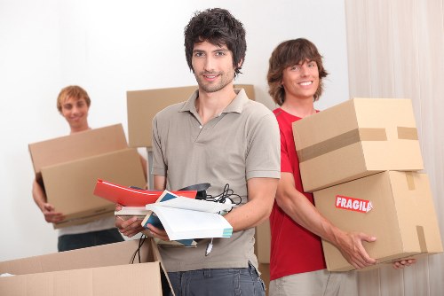 Professional movers loading items for a Fulham relocation
