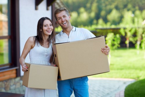 Professional furniture transport through a Fulham property