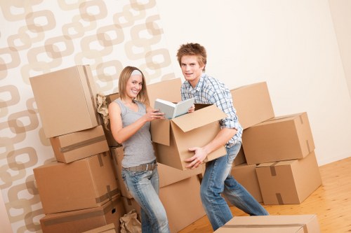 Local moving team loading items into a van in Fulham