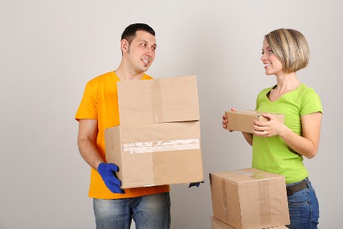 Packed boxes and furniture ready for flat removals in Fulham